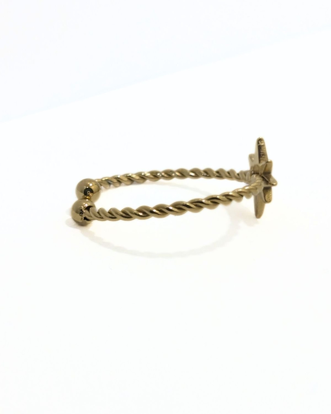 Bague femme acier doré torsadé avec astre