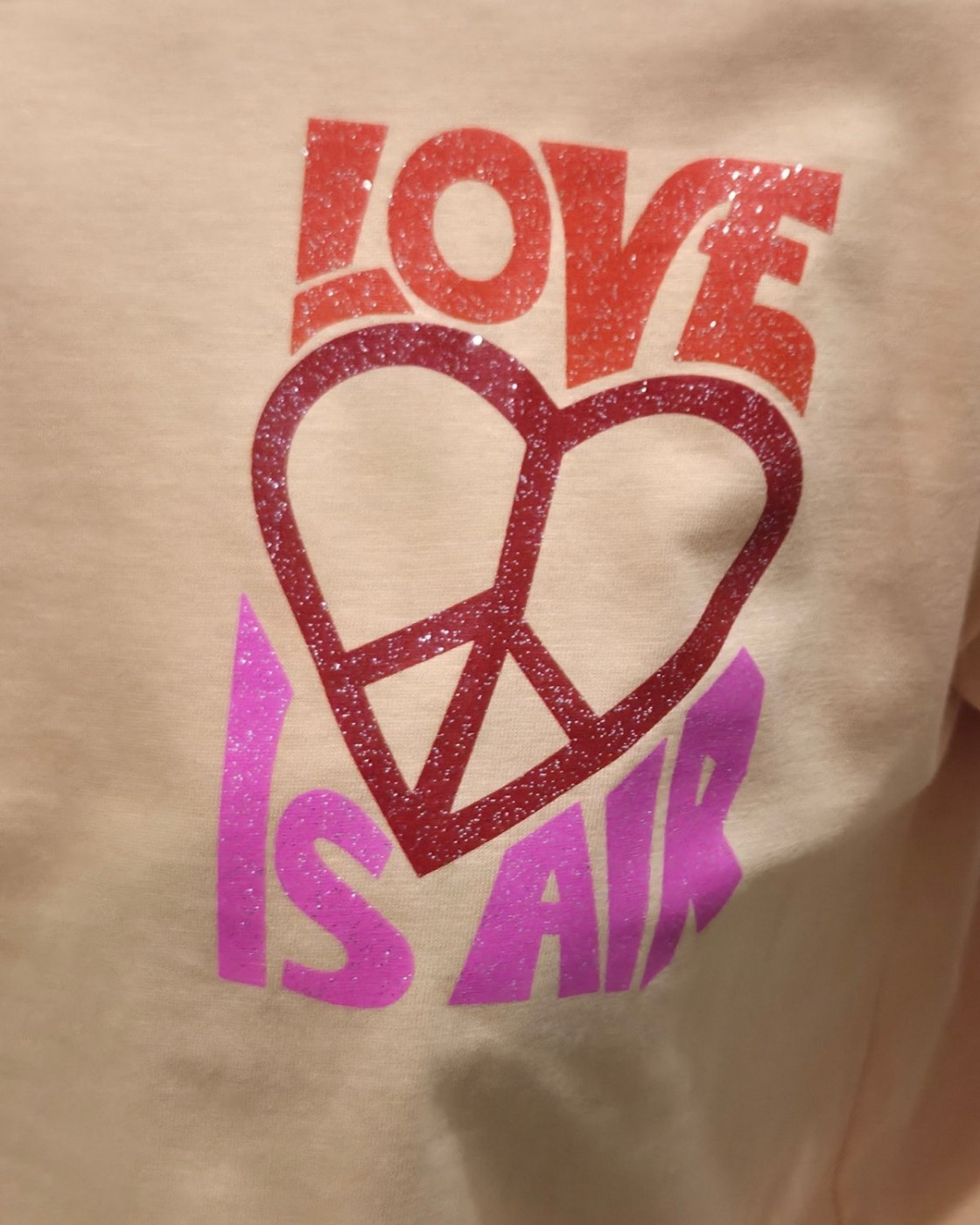 T-Shirt femme orange Love is in the air paillettes