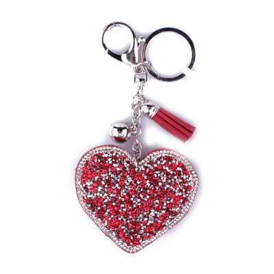 Porte-clés coeur rouge à perles et strass argent et pompon rouge