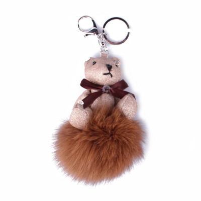 Porte-clés peluche ourson pailleté beige et son pompon camel