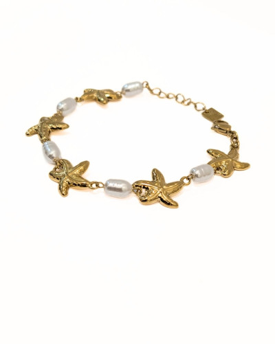 Bracelet femme acier doré et étoiles de mer nacrées