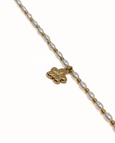 Chaine de cheville acier doré perles nacrées et pendentif fleur