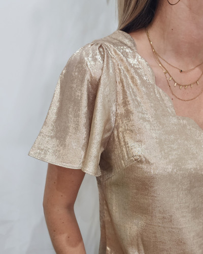 Blouse dorée femme sale