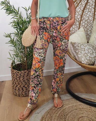 Pantalon fluide imprimé floral vert orange et violet