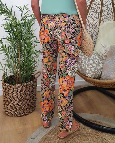 Pantalon fluide imprimé floral vert orange et violet