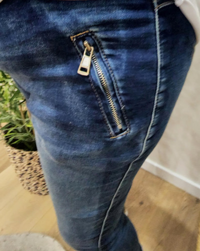 Jean femme fluide élastique jean foncé délavé poches zippées