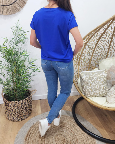 Jean femme bleu clair slim coupe confort strass et perles poches