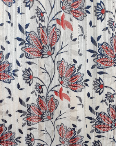 Robe blanche à motifs fleuris rouge et bleus bretelles à noeuds