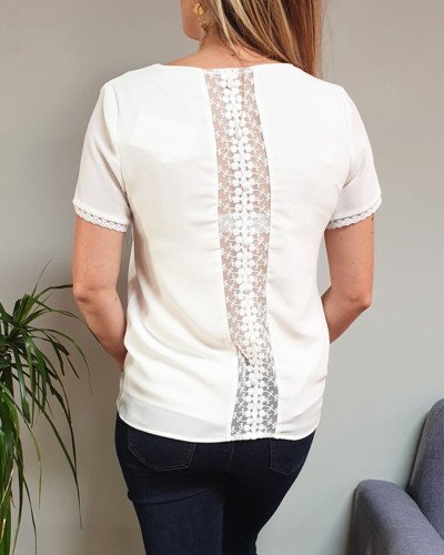 Top blanc manches courtes dos broderies ajourées à boutons