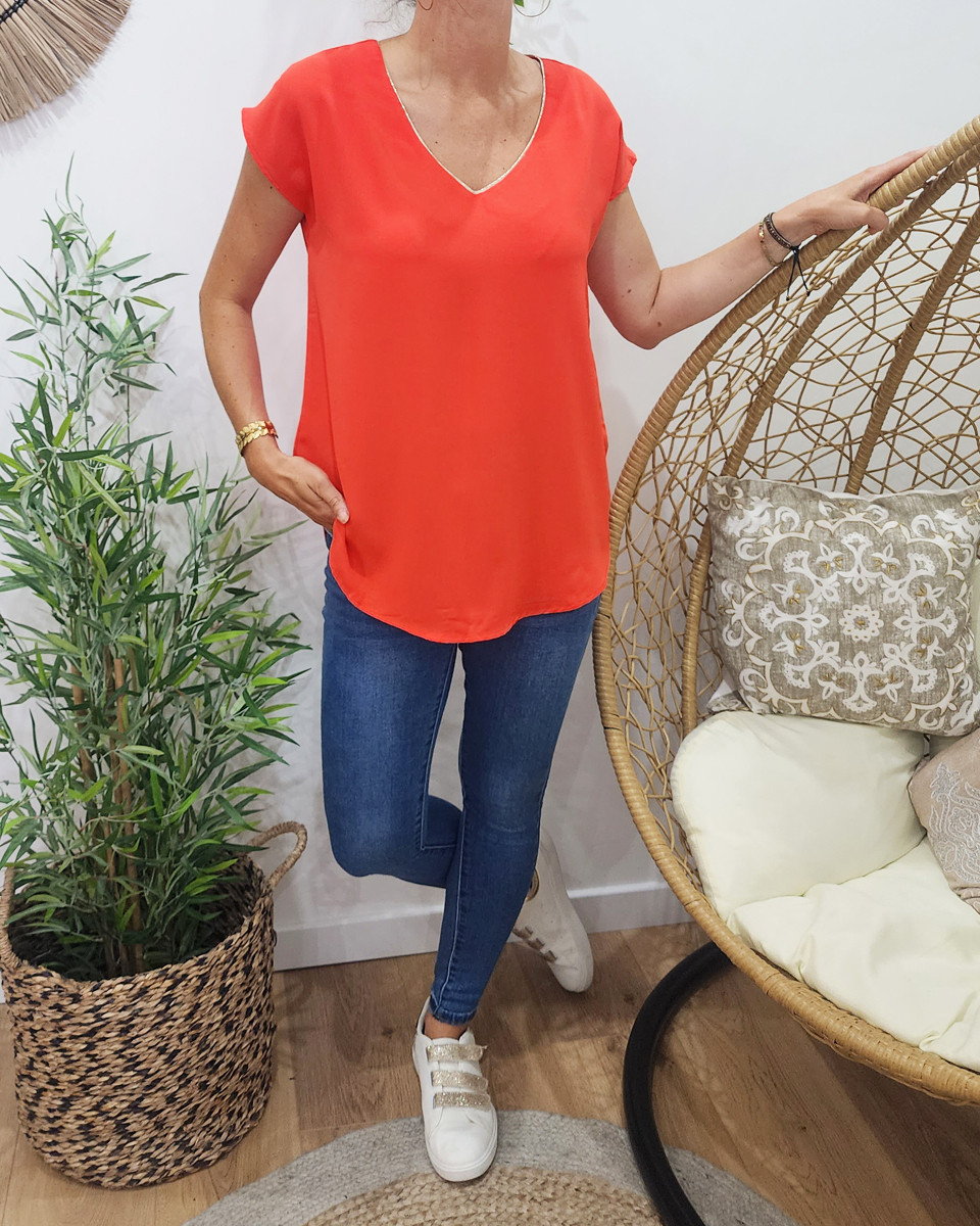 Blouse femme orange liseré doré dos noué