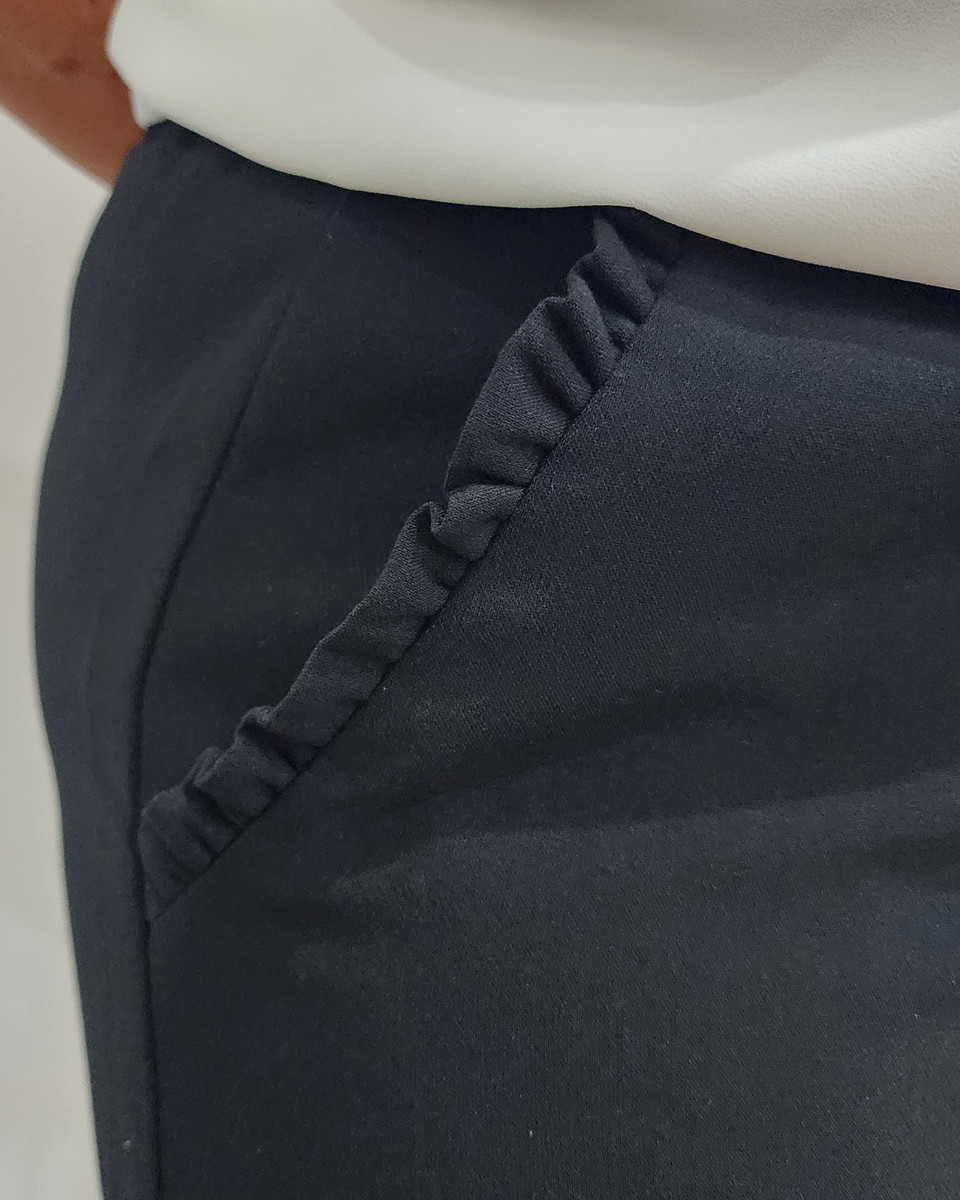 Jupe femme noire poches à volants