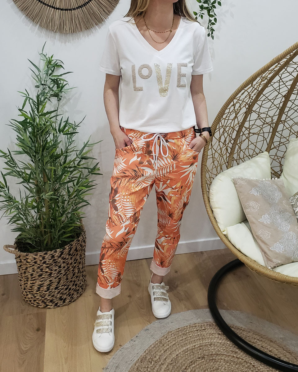 Pantalon fluide orange feuillages blancs et marrons