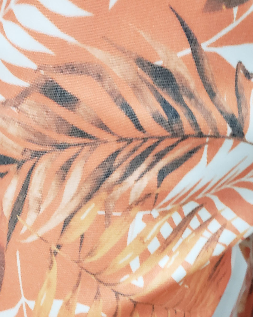 Pantalon fluide orange feuillages blancs et marrons