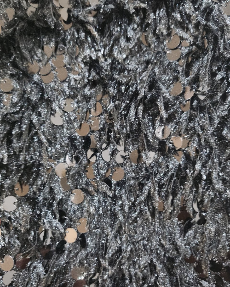 Pull femme noir effet plumes et sequins Violetta