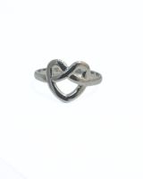 Bague femme acier argenté coeur bretzel