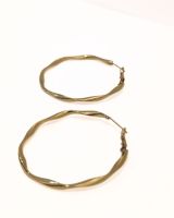 Boucles d'oreilles femme anneaux torsadés acier doré
