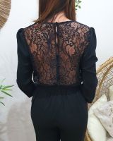 Combinaison pantalon femme noire dos dentelle