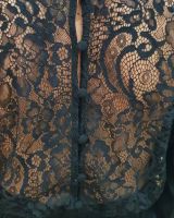 Combinaison pantalon femme noire dos dentelle