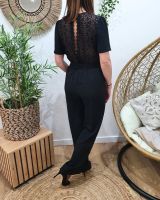 Combinaison pantalon femme noire dos dentelle fleurie aujouré