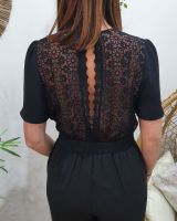 Combinaison pantalon femme noire dos dentelle fleurie aujouré