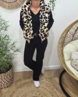 Gilet femme bouclettes léopard sans manches beige et noir