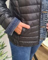 Doudoune femme noire rebords jeans