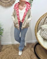 Doudoune femme sans manches dorée et motifs fuchsias orangés réversible
