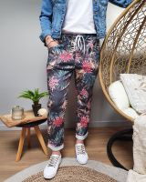Pantalon fluide noir feuillages exotiques multicolores