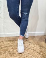 Jean femme bleu 7/8 skinny poches effet abîmé