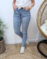 Jean femme slim power stretch push up bleu clair délavé coupe confort