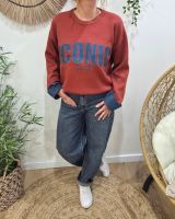 Pull femme terracotta ICONIC club bleu jean