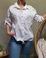 Chemise blanche poches et dos dentelle