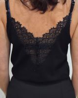 Top femme noir dos V brodé Céleste