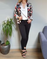 Veste tailleur noire à fleurs mutlicolores