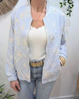 Bombers femme rayé blanc et bleu broderies fleurs beiges